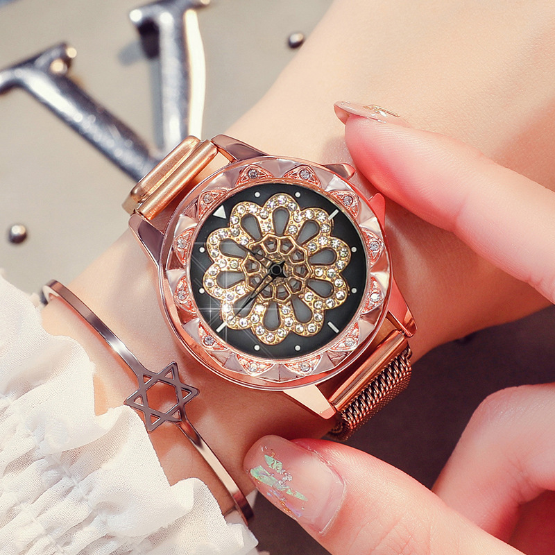 Đồng hồ nam châm mặt hình hoa xoay 